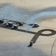 Illustration for article titled A Gigantic Sand Drawing Is How Land Rover Said Farewell To The Defender